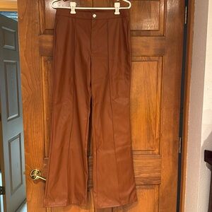 New with tags. Pleather pants. Great for fall and the holidays.